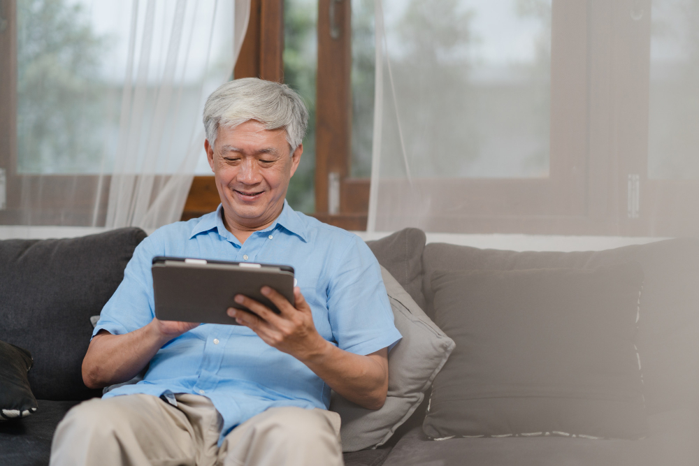 asian-senior-men-using-tablet-home-asian-senior-chinese-male-search-information-about-how-good-health-internet-while-lying-sofa-living-room-home-concept