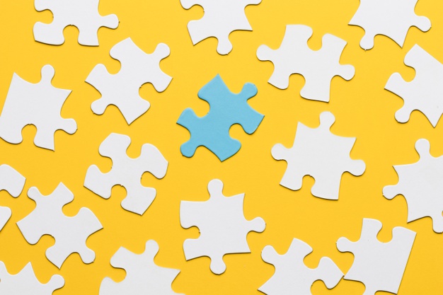 blue-puzzle-with-white-jigsaw-piece-yellow-background_23-2148207373