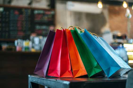 colorful-paper-bags-placed-table_1150-18774 (1)