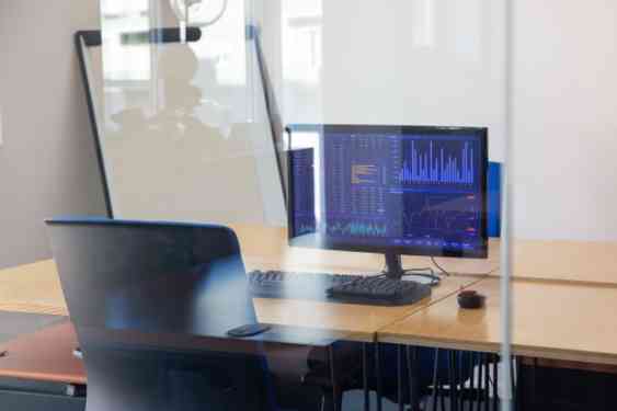 empty-traders-workplace-glass-wall-office-room-with-flipchart-desk-with-chair-computer-trading-charts-monitor-stock-market-exchange-concept_74855-14234 (1)