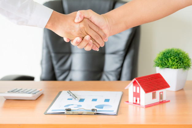 hands-agent-client-shaking-hands-after-signed-contract-buy-new-apartment_1150-14835