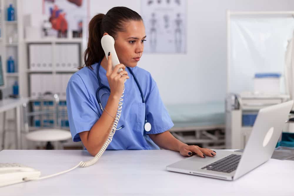 medical-practitioner-answering-phone-calls