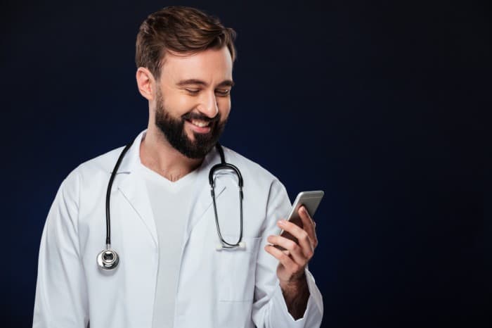 portrait-happy-male-doctor-dressed-uniform