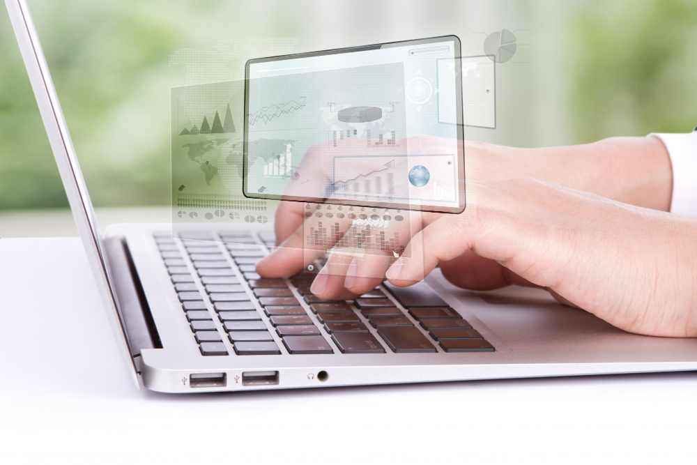 worker-looking-laptop-graphics