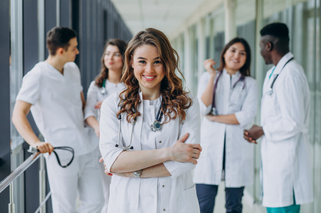 young-female-doctor-posing-corridor-hospital_1303-21212